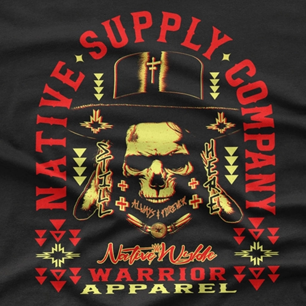 A black short-sleeve graphic T-shirt featuring a Native Supply Company skull design with a gold hat, red text, and Native American pattern.