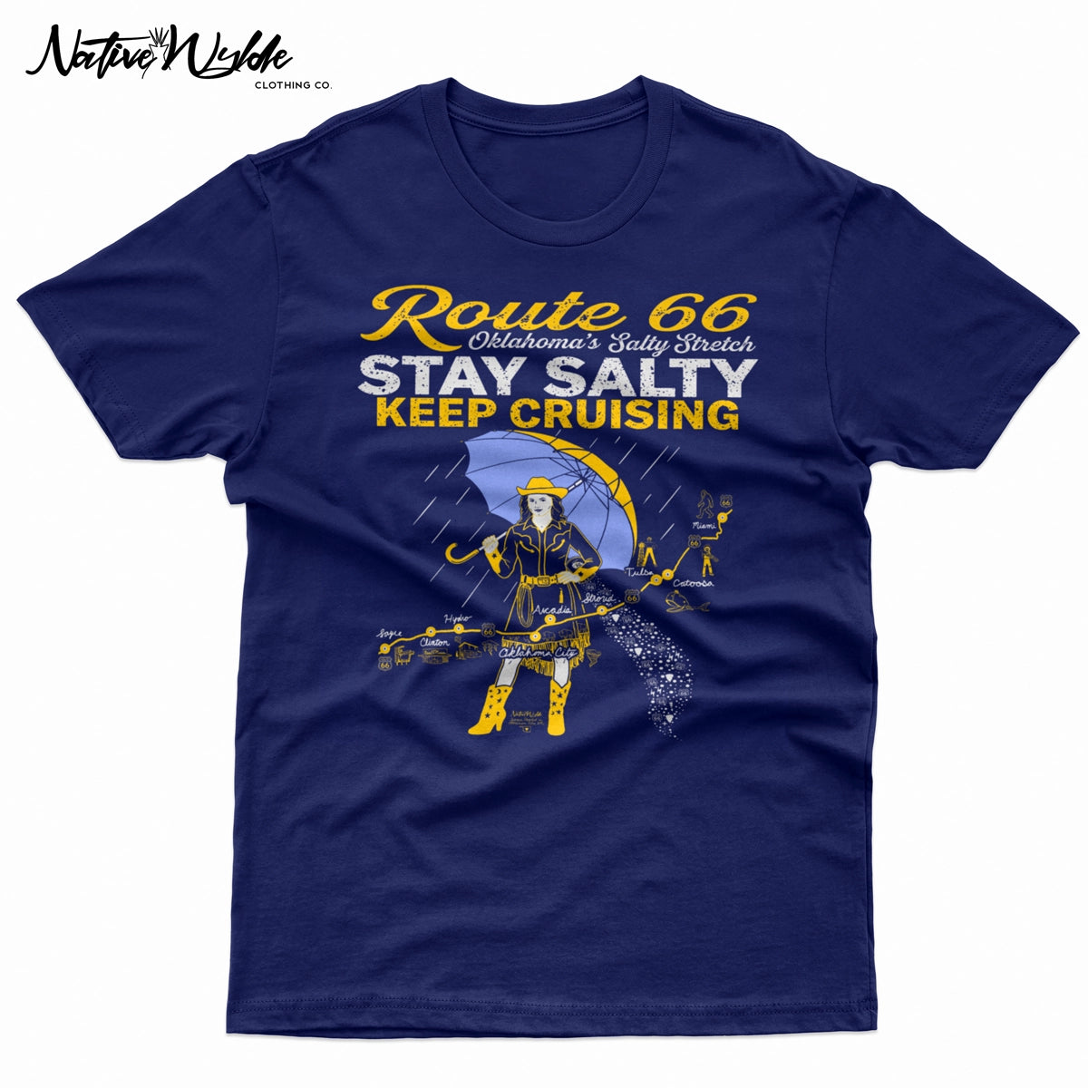 A navy blue graphic print featuring a stylized Route 66 theme with the text 'Route 66 Oklahoma's Salty Stretch', 'STAY SALTY', and 'KEEP CRUISING'. The design includes a woman holding a yellow umbrella, a map with labeled cities, and distressed yellow and white lettering.