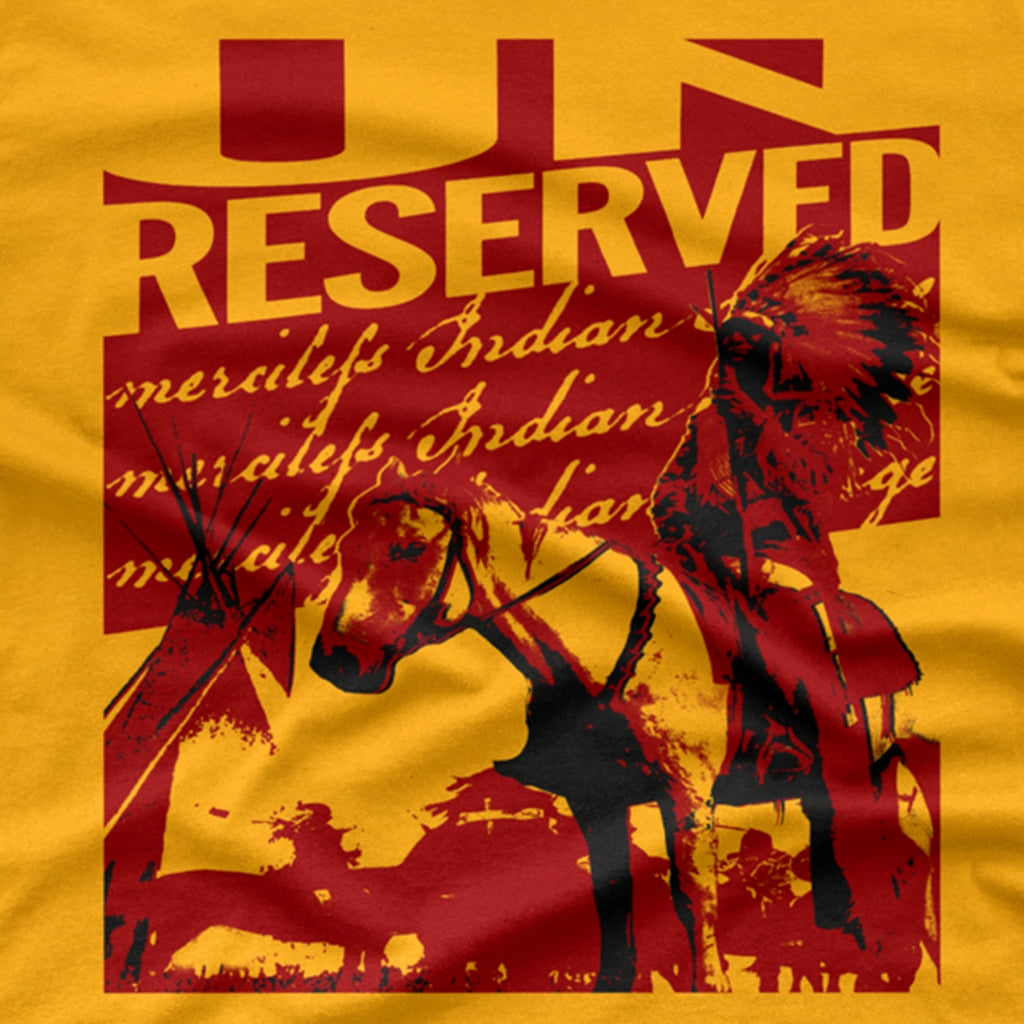 A yellow short-sleeve T-shirt with a red graphic print on the front featuring the text 'UN RESERVED' and an illustration of a horse and rider.Additional text: Merciless Indian Savage